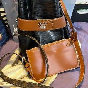 Louis Vitton twist bucket bag epi leather